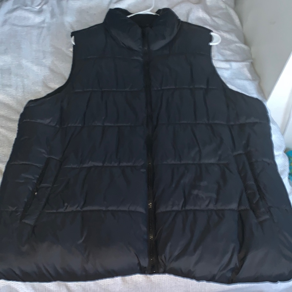 Black sleeveless puffer coat